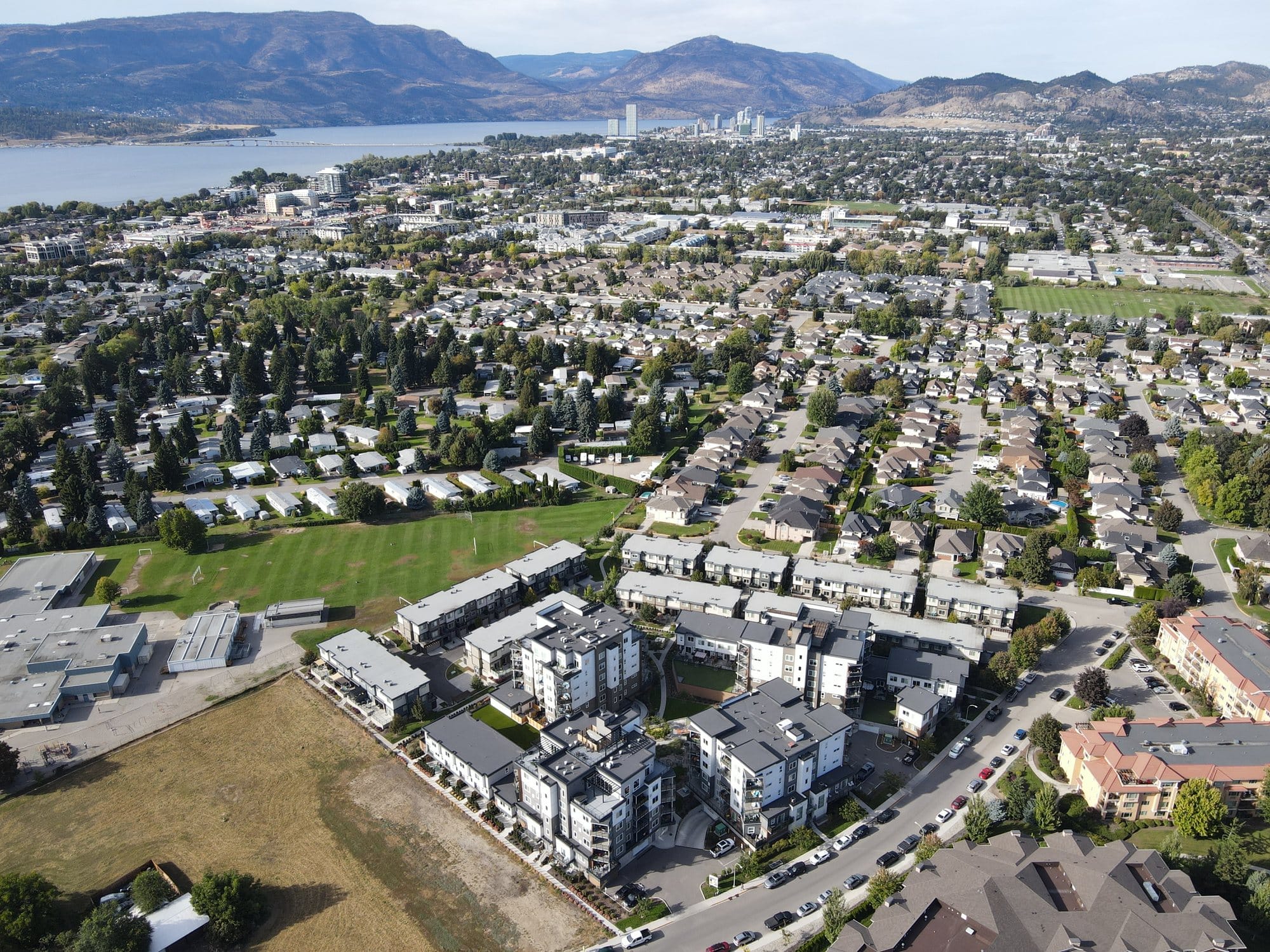 Green Square from the air with Okanagan Lake and downtown Kelowna in the distance