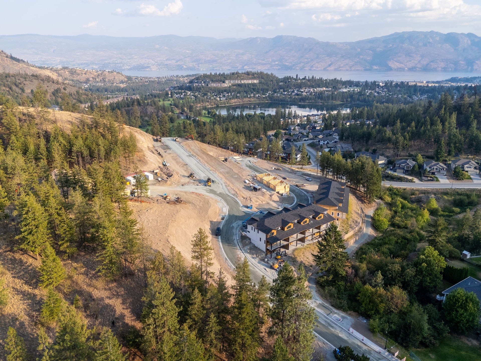 Paramount Peak from the air, buildings 1 and 2 on the hillside with the valley and Okanagan Lake beyond