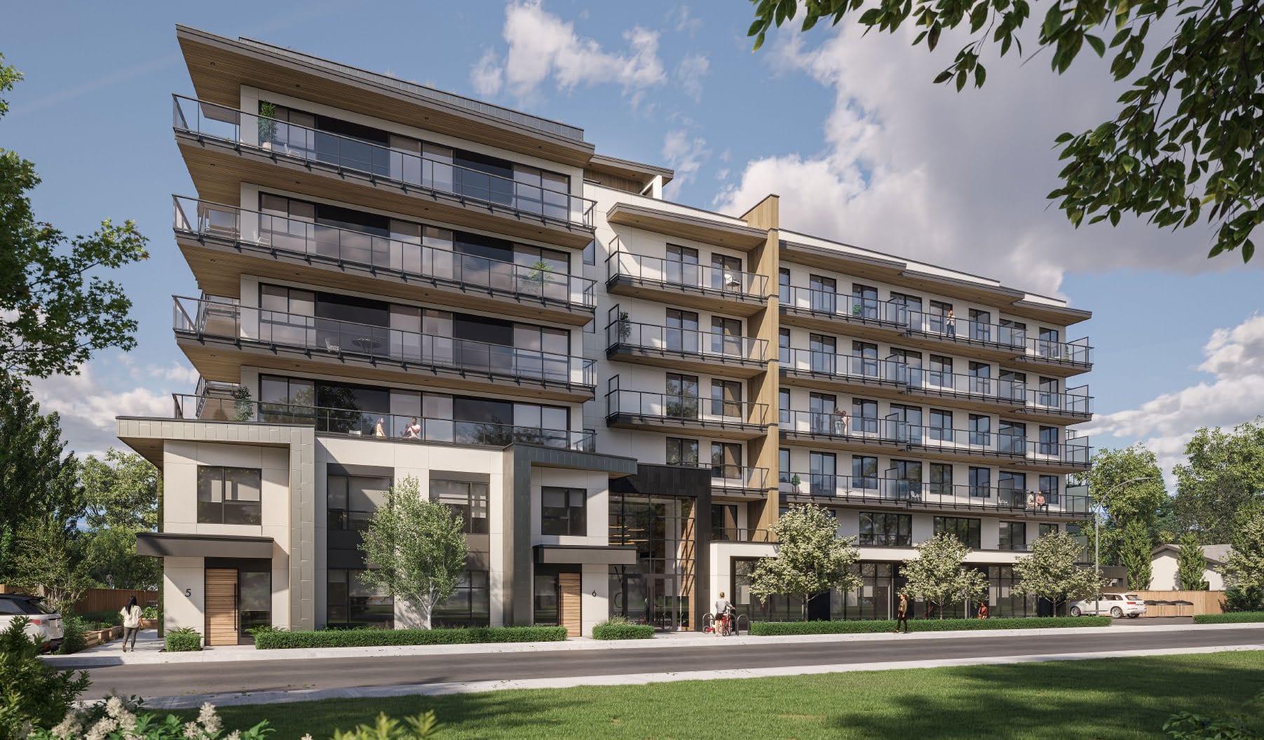 Rendering of Revo Kelowna from the street in Landmark-Capri, balconies on every floor above the townhome row