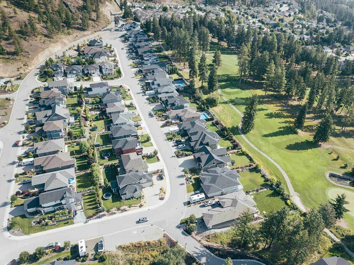 A Tallus Ridge street from the air, the golf course beside it