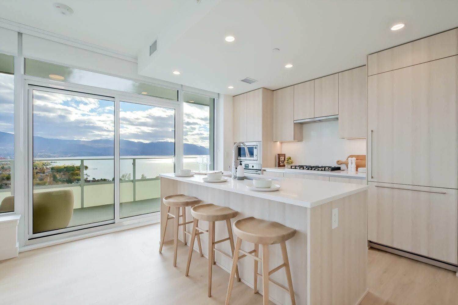 Kitchen island and lake view at Water Street by the Park, in the same floor plan as unit 1904