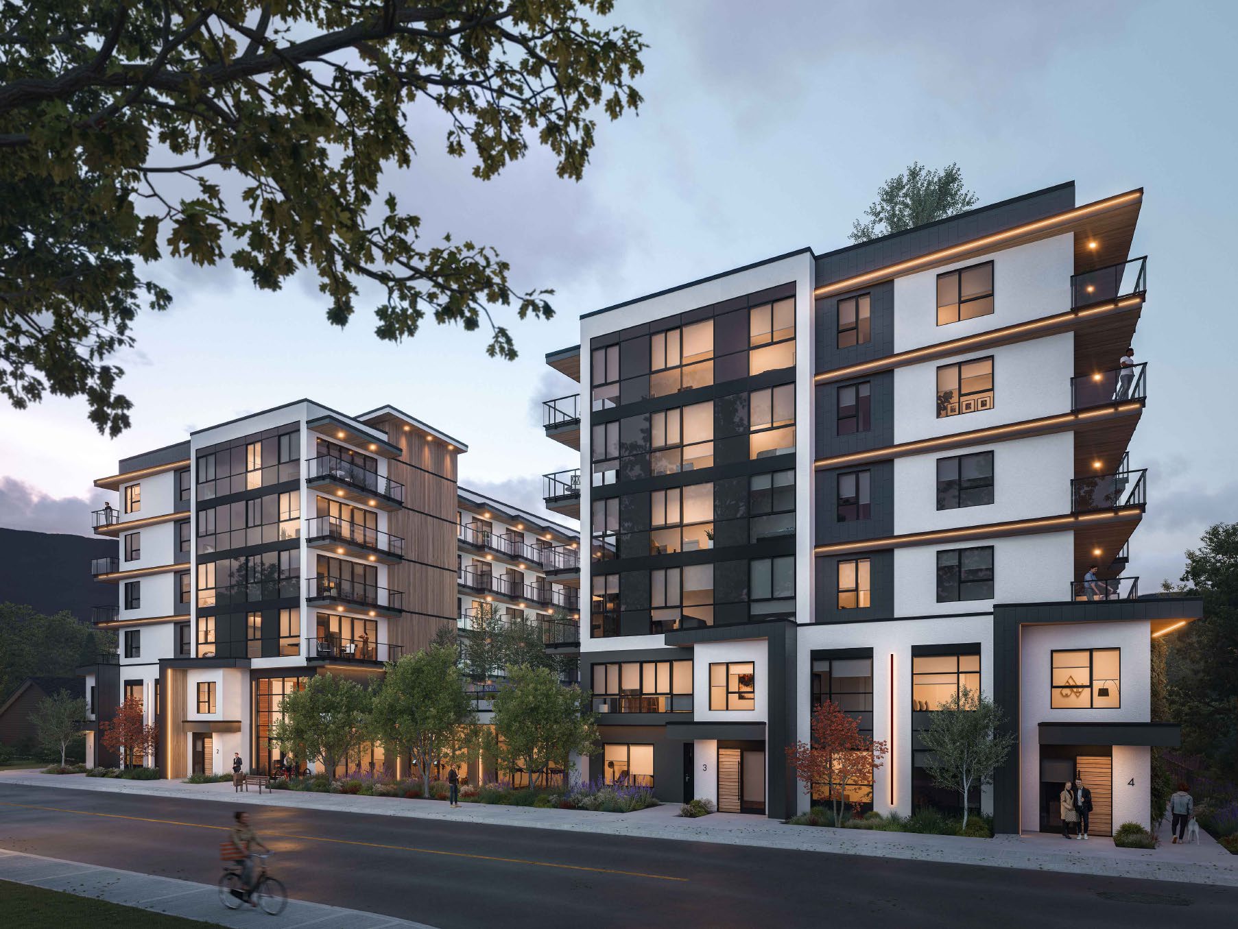 Rendering of Revo Kelowna condos at dusk, six storeys at 1280 Sutherland Avenue in the Landmark-Capri district of Kelowna